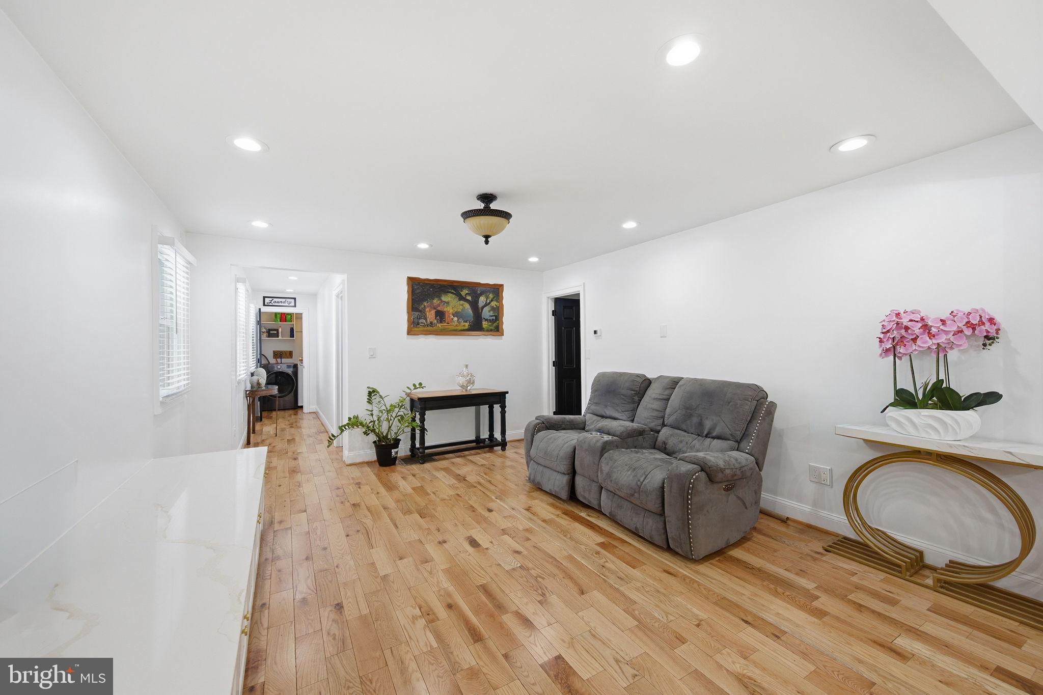 3524 Blenheim Road Phoenix, MD 21131 - Photo 30 of 61 a living room with furniture and a wooden floor