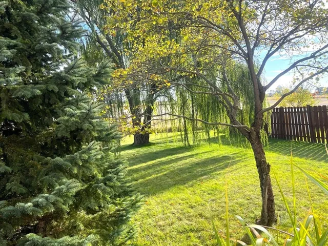 a view of a room with window and a kitchen