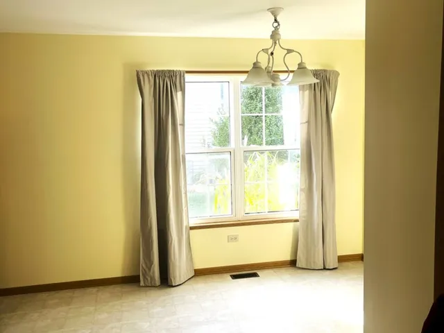 a kitchen with a sink and a window
