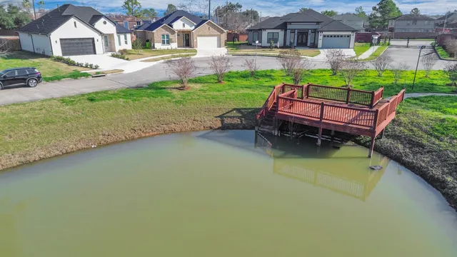 front view of a house with a yard porch and sitting area