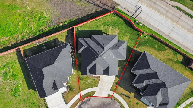 an aerial view of a city and lake view