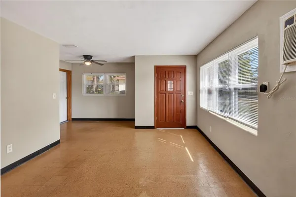 an empty room with windows