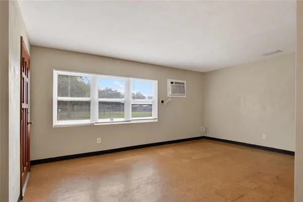an empty room with a window