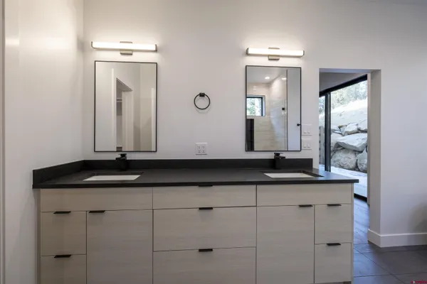 a bathroom with a shower and a toilet