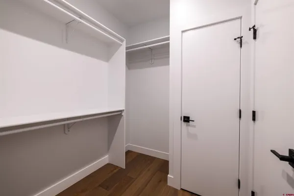 a kitchen with stainless steel appliances a sink and cabinets