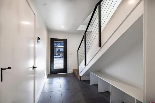 a view of kitchen with cabinets and wooden floor