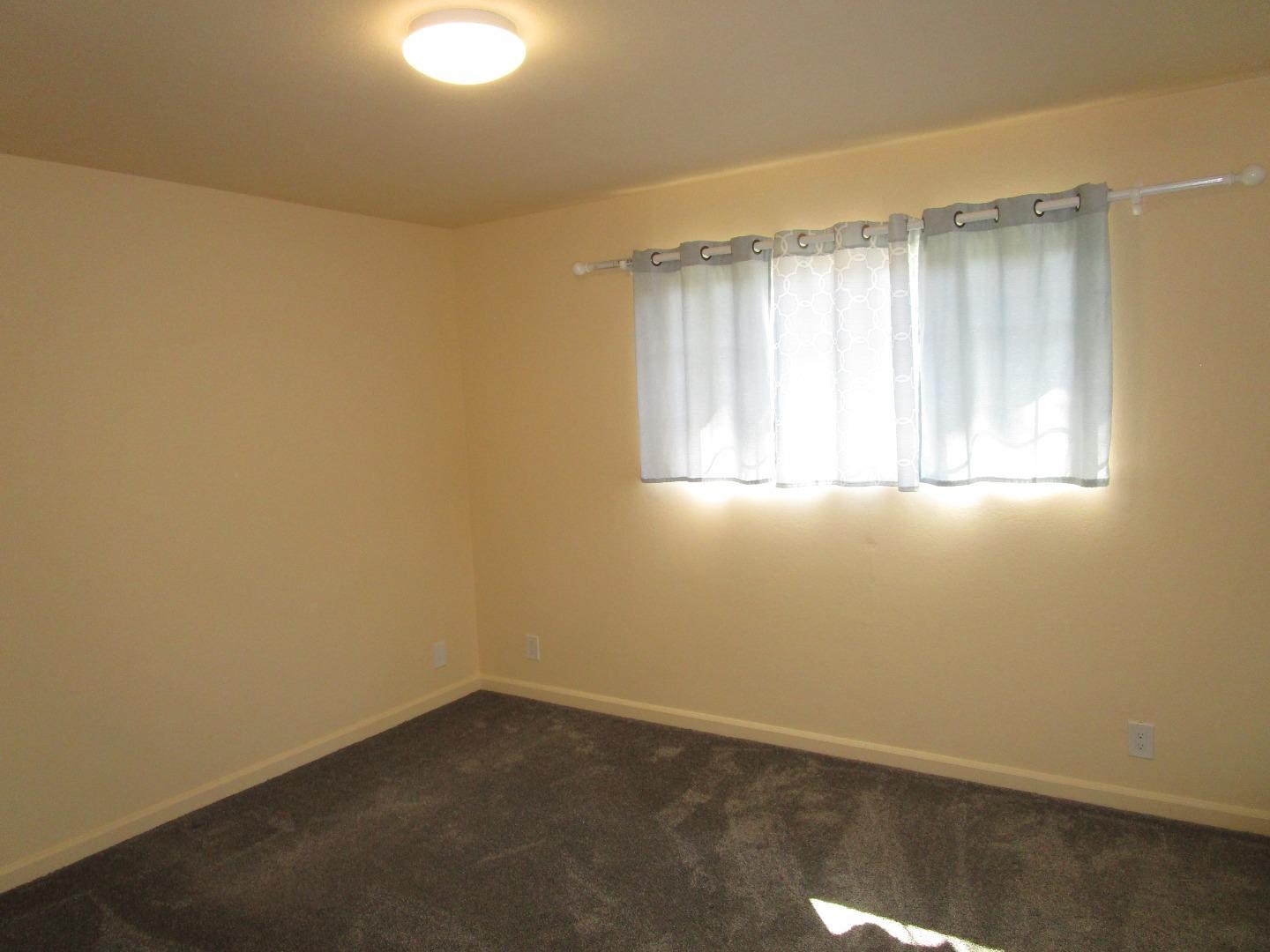 7759 Murray Avenue Gilroy, CA 95020 - Photo 7 of 11 an empty room with a window
