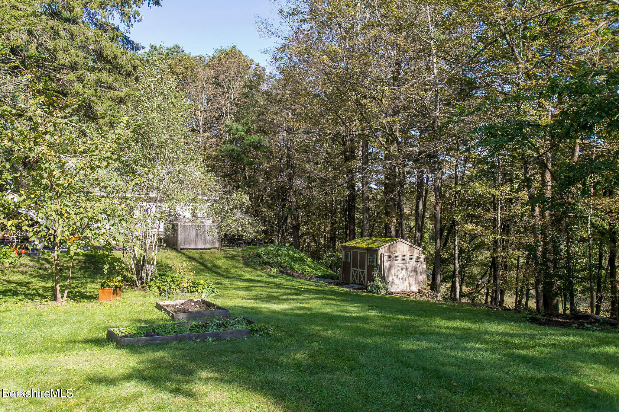 27 Glendale Road Stockbridge, MA 01262 - Photo 22 of 31 a view of a backyard with large trees