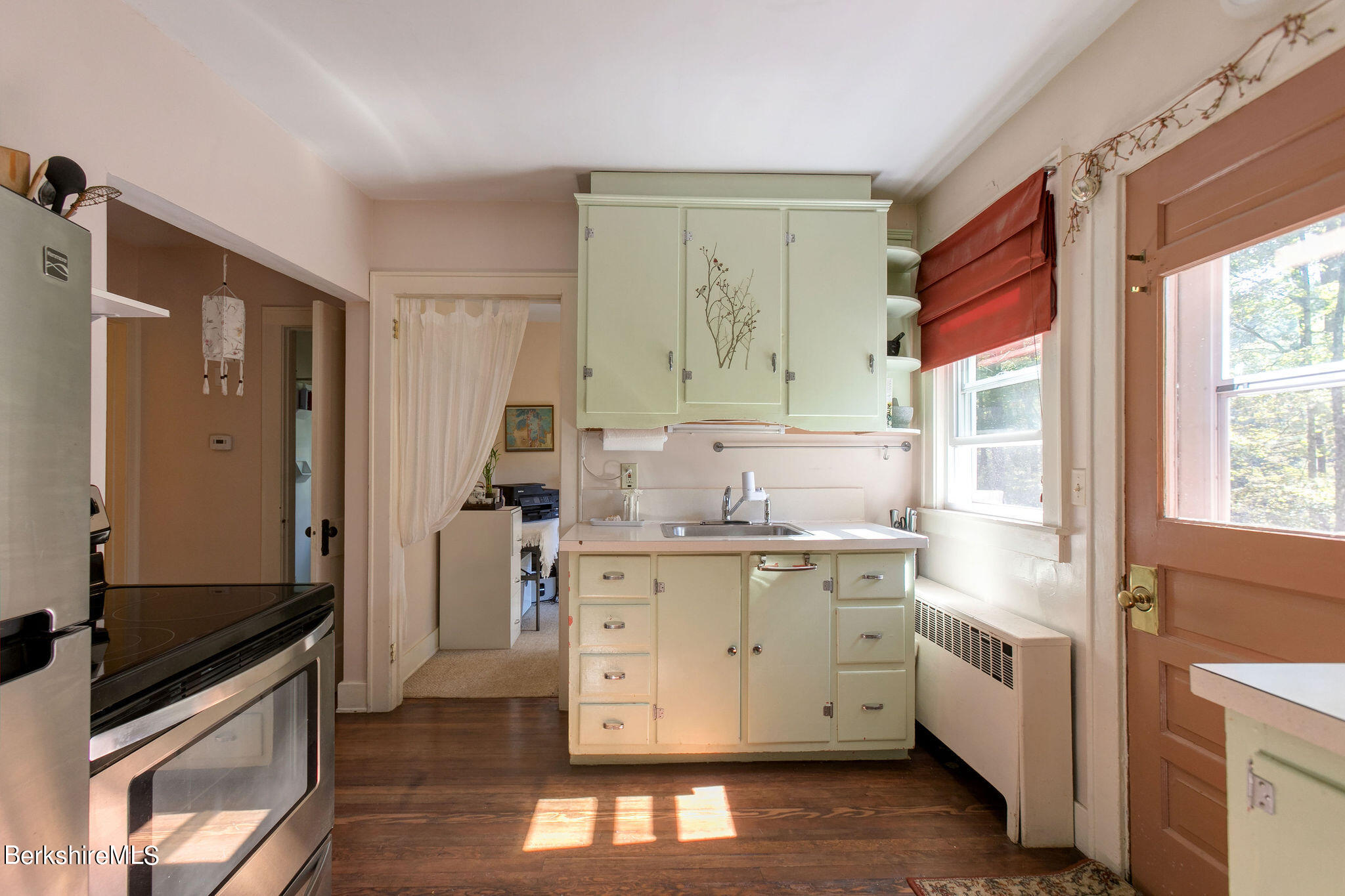 27 Glendale Road Stockbridge, MA 01262 - Photo 8 of 31 a kitchen with a stove a sink and a refrigerator