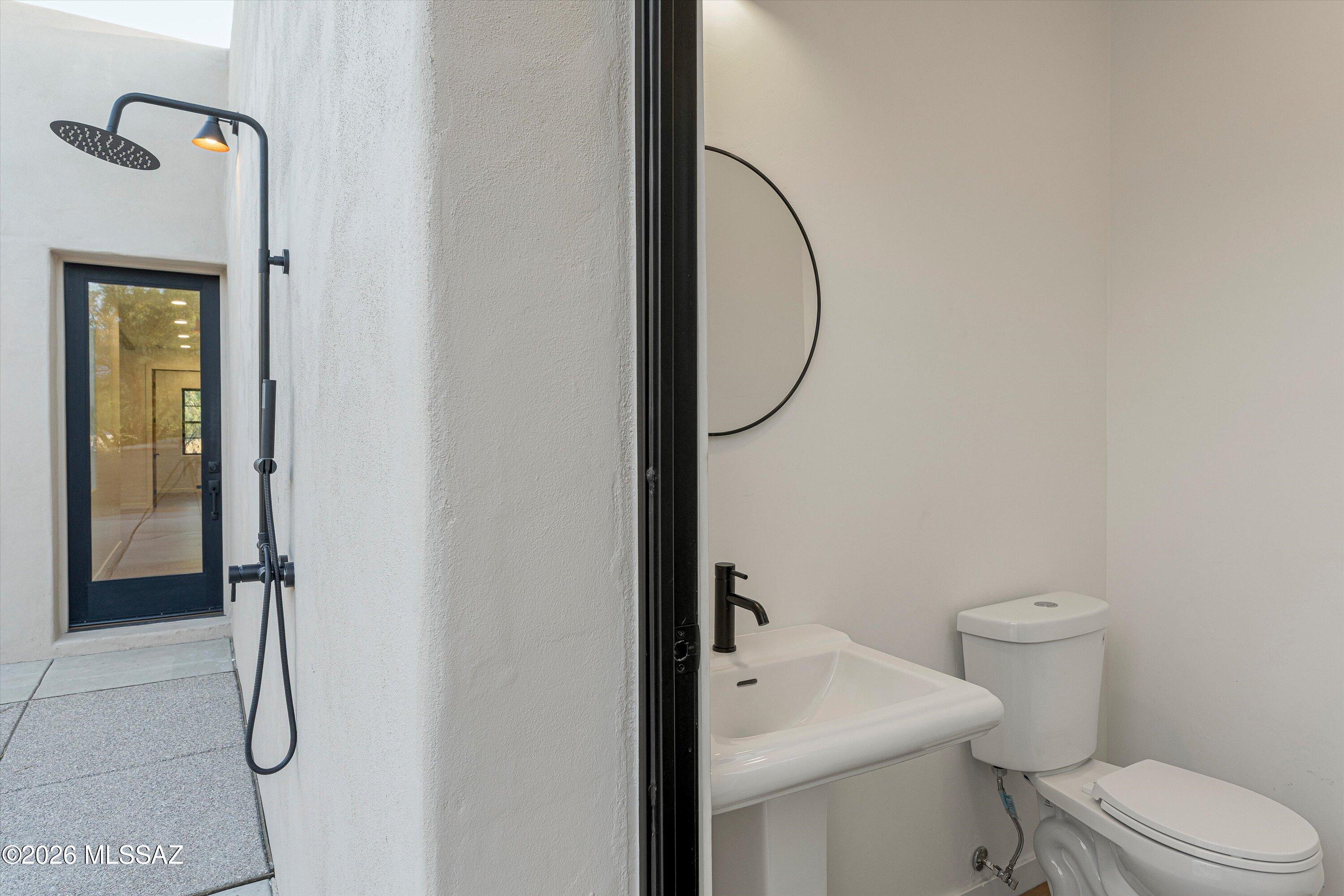 5259 East Fort Lowell Road Tucson, AZ 85712 - Photo 35 of 50 a bathroom with a toilet and a shower