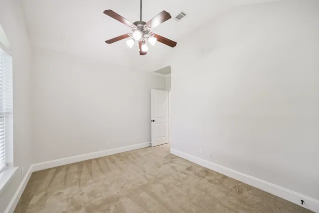 a bedroom with a bed and a cabinets