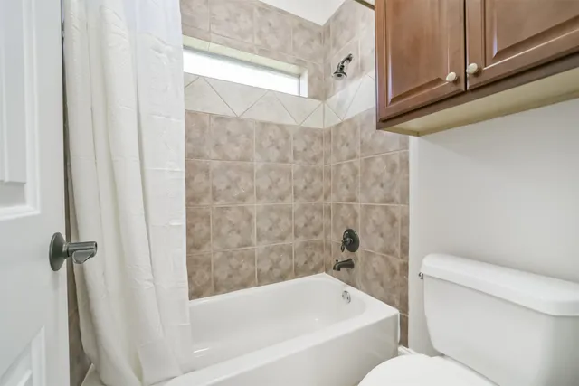 a bathroom with a sink double vanity and a mirror
