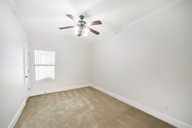 a bathroom with a toilet and a bathtub