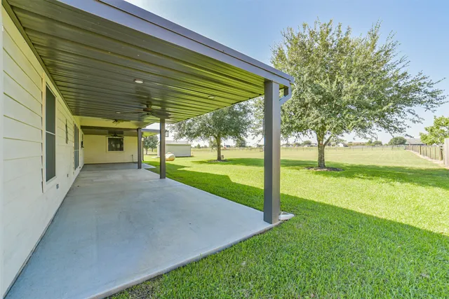 a view of a backyard with a small cabin