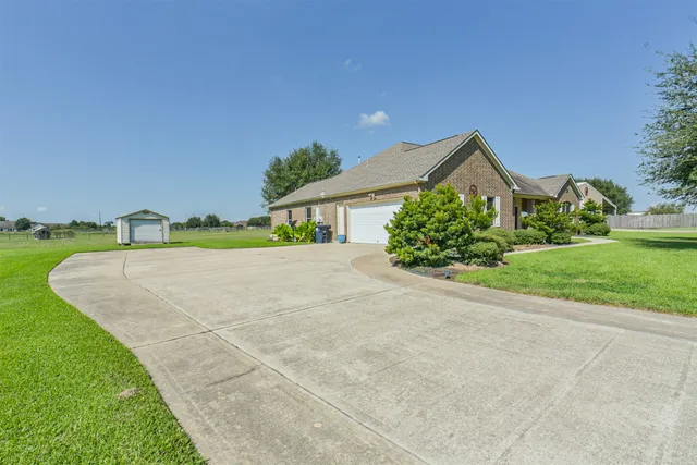 a view of a park with large trees