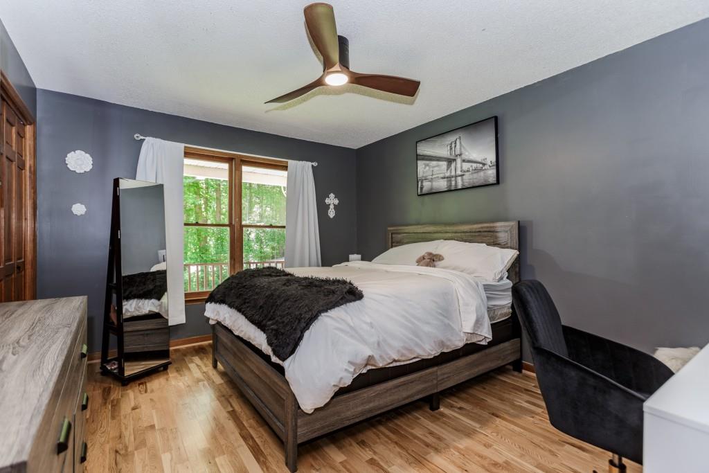 750 Jett Roberts Road Jefferson, GA 30549 - Photo 19 of 37 a bedroom with a bed and window