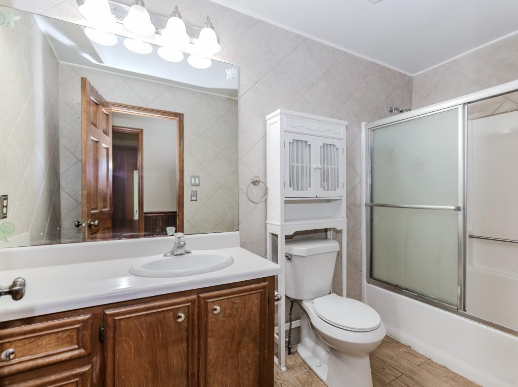 750 Jett Roberts Road Jefferson, GA 30549 - Photo 23 of 37 a bathroom with a sink a toilet and shower