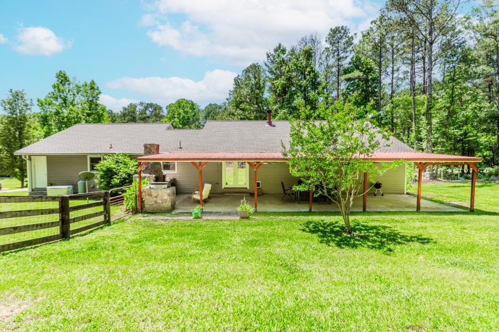 750 Jett Roberts Road Jefferson, GA 30549 - Photo 25 of 37 a view of a house with a yard porch and sitting area