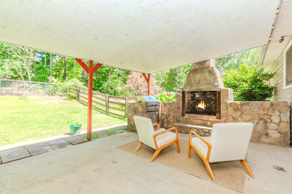 750 Jett Roberts Road Jefferson, GA 30549 - Photo 28 of 37 a building outdoor space with patio furniture and potted plants