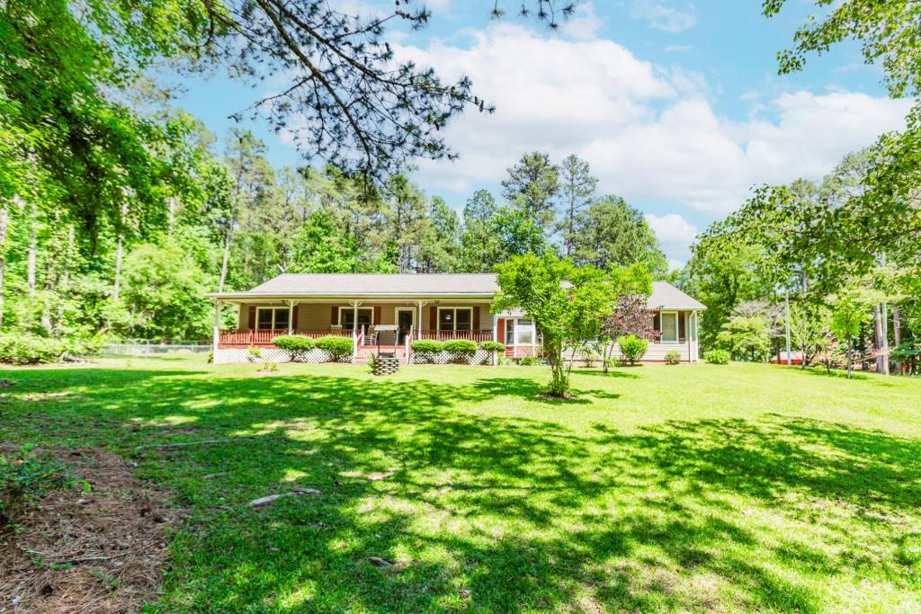 750 Jett Roberts Road Jefferson, GA 30549 - Photo 34 of 37 a front view of a house with a garden