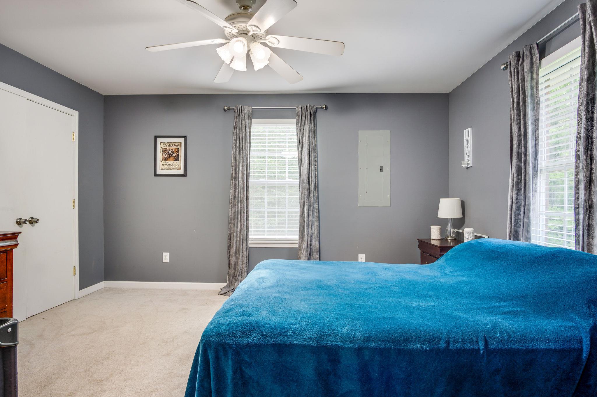 2208 Mt Pleasant Cemetery Road Primm Springs, TN 38476 - Photo 13 of 21 a bedroom with a large bed and a window