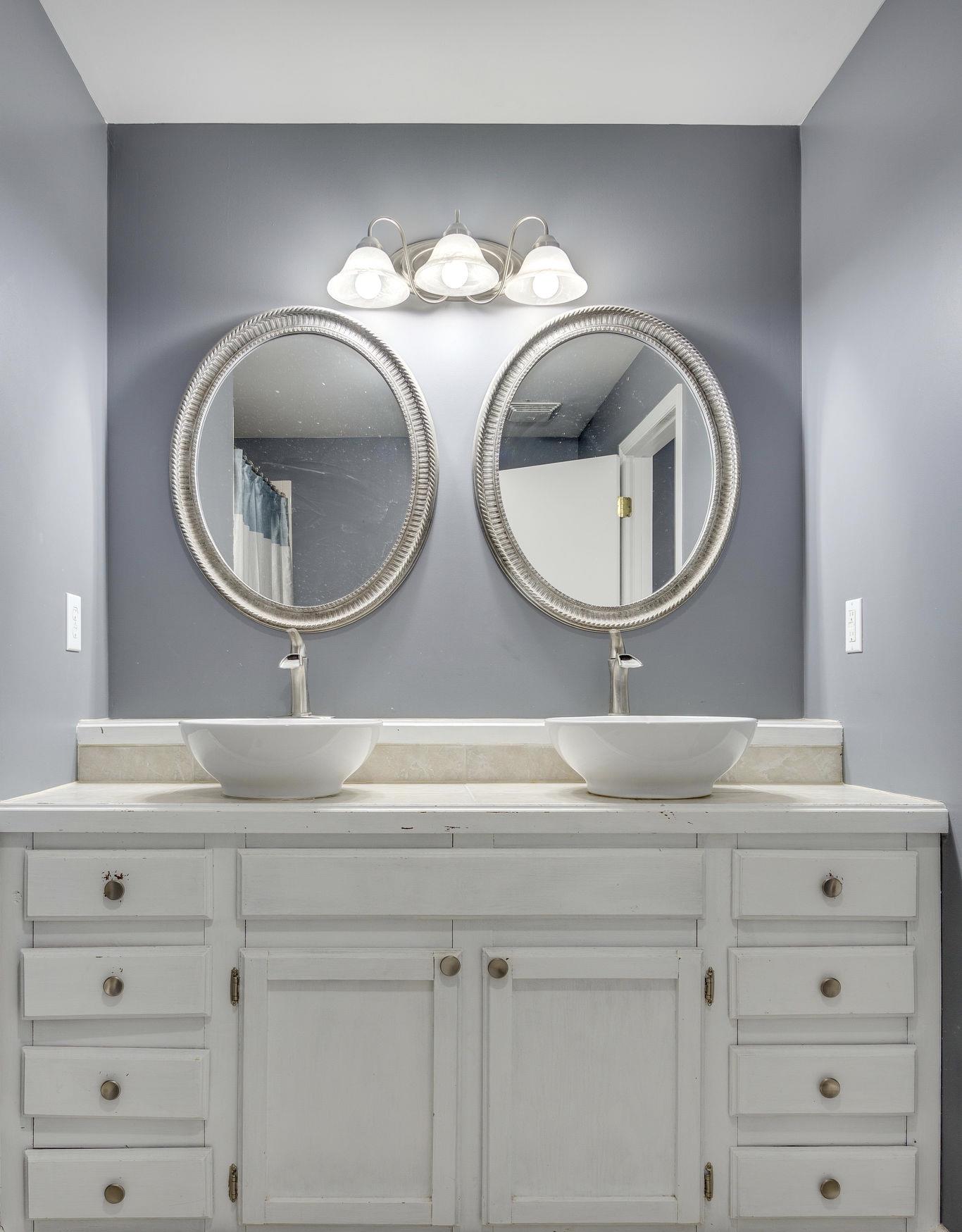 2208 Mt Pleasant Cemetery Road Primm Springs, TN 38476 - Photo 14 of 21 a bathroom with a toilet and a mirror