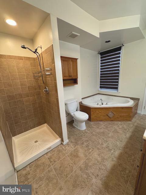 1767 E Street Northeast Washington, DC 20002 - Photo 5 of 8 a bathroom with a tub a toilet and a shower