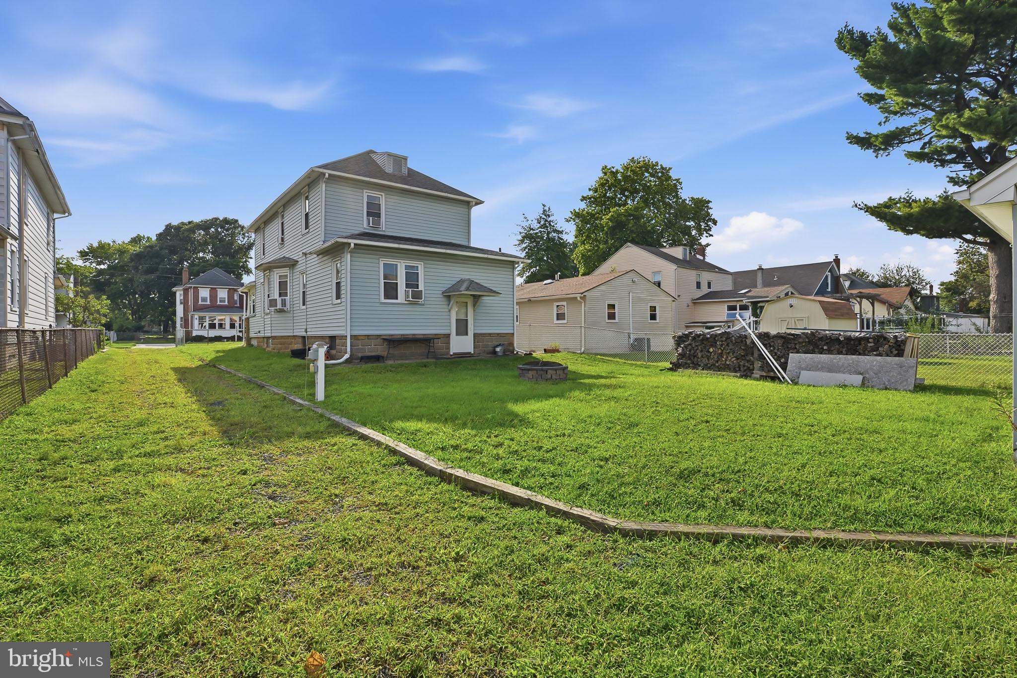 227 Heulings Avenue Riverside, NJ 08075 - Photo 34 of 36 Spacious yard with charming home backdrop.