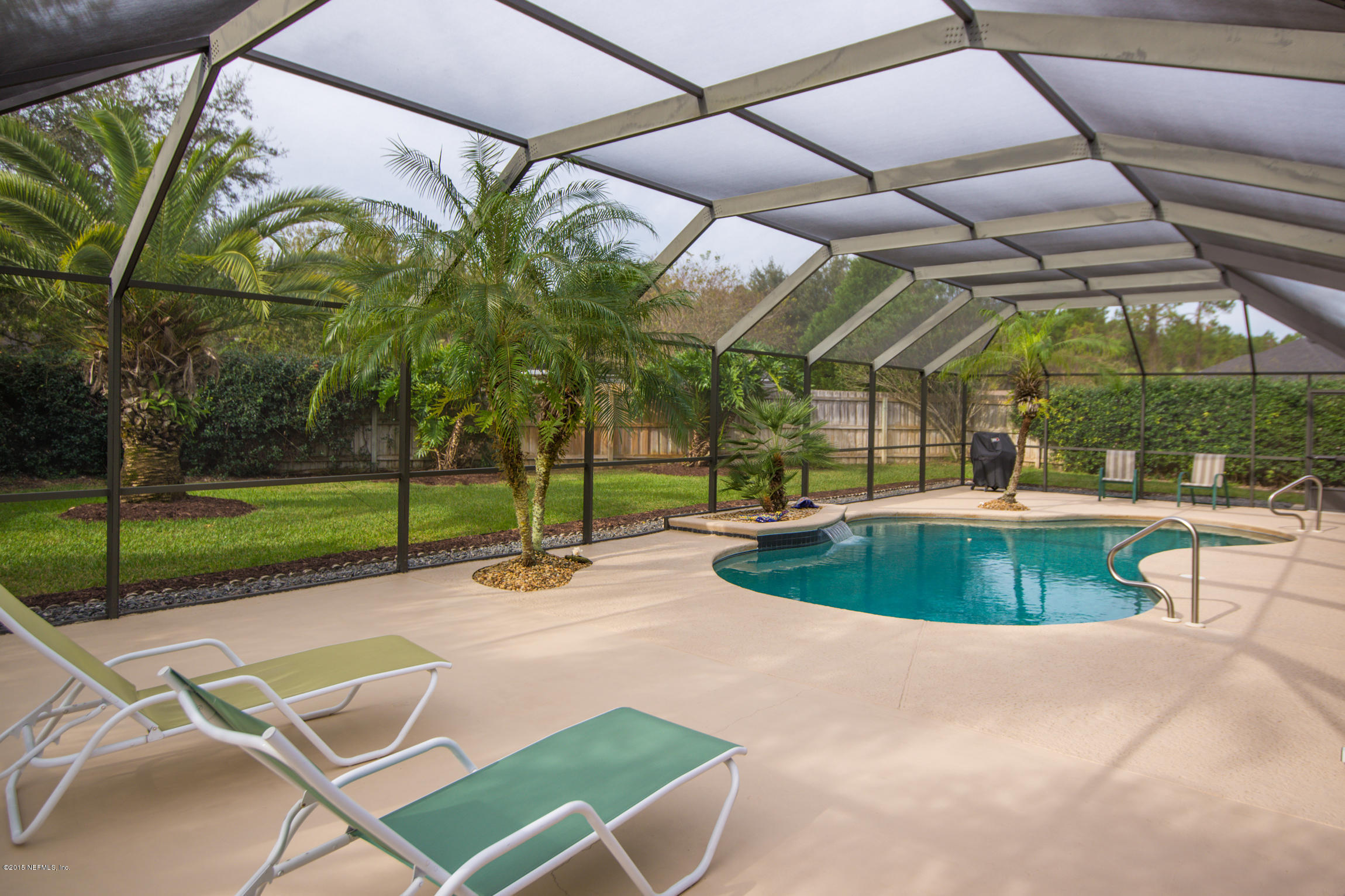 213 Merida Road St. Augustine, FL 32086 - Photo 14 of 34 a view of a swimming pool with a patio