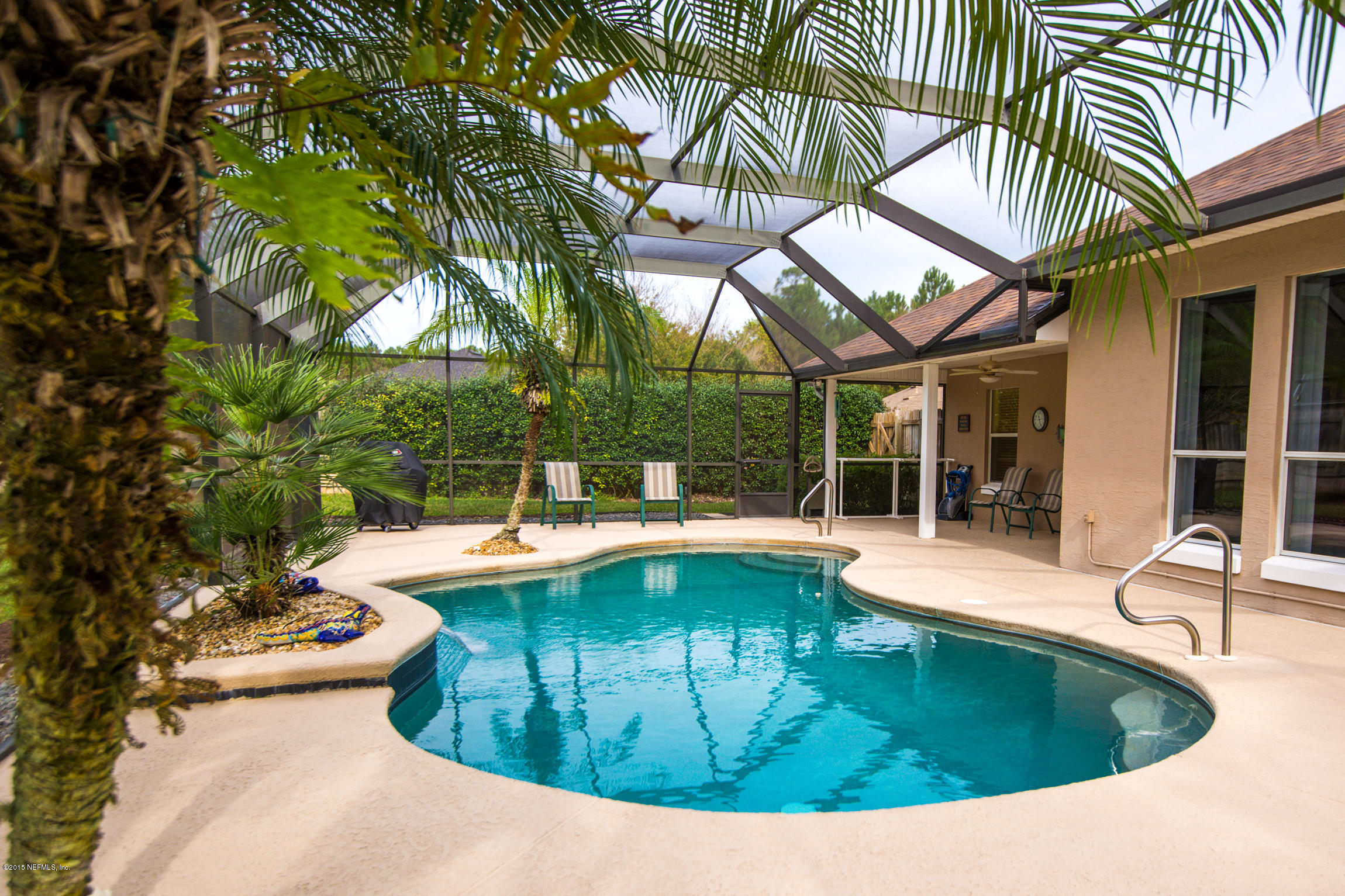 213 Merida Road St. Augustine, FL 32086 - Photo 15 of 34 a view of a swimming pool with a patio