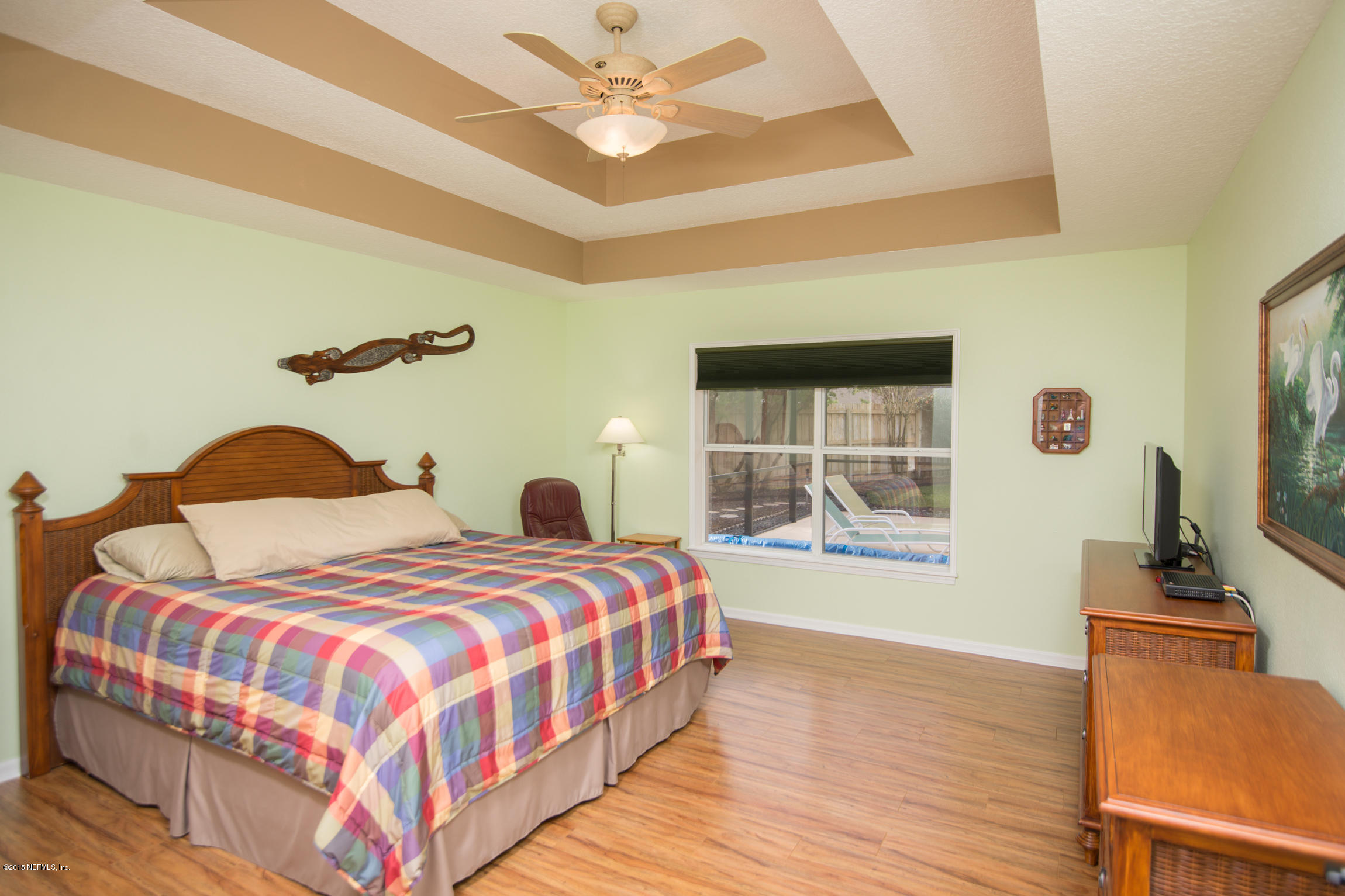 213 Merida Road St. Augustine, FL 32086 - Photo 17 of 34 a bedroom with double bed and a window