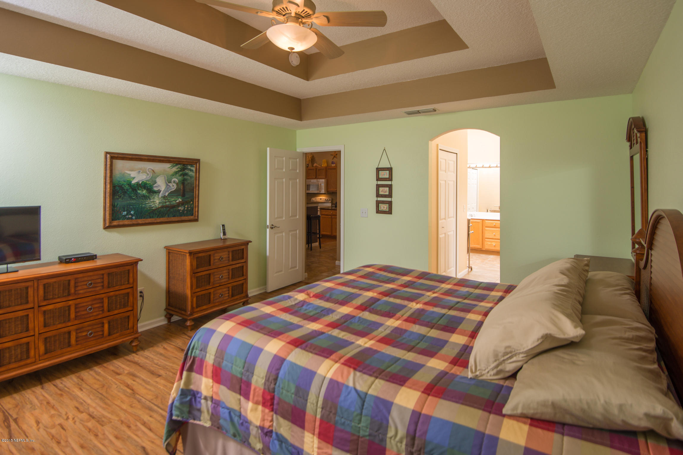 213 Merida Road St. Augustine, FL 32086 - Photo 18 of 34 a bedroom with a bed and furniture
