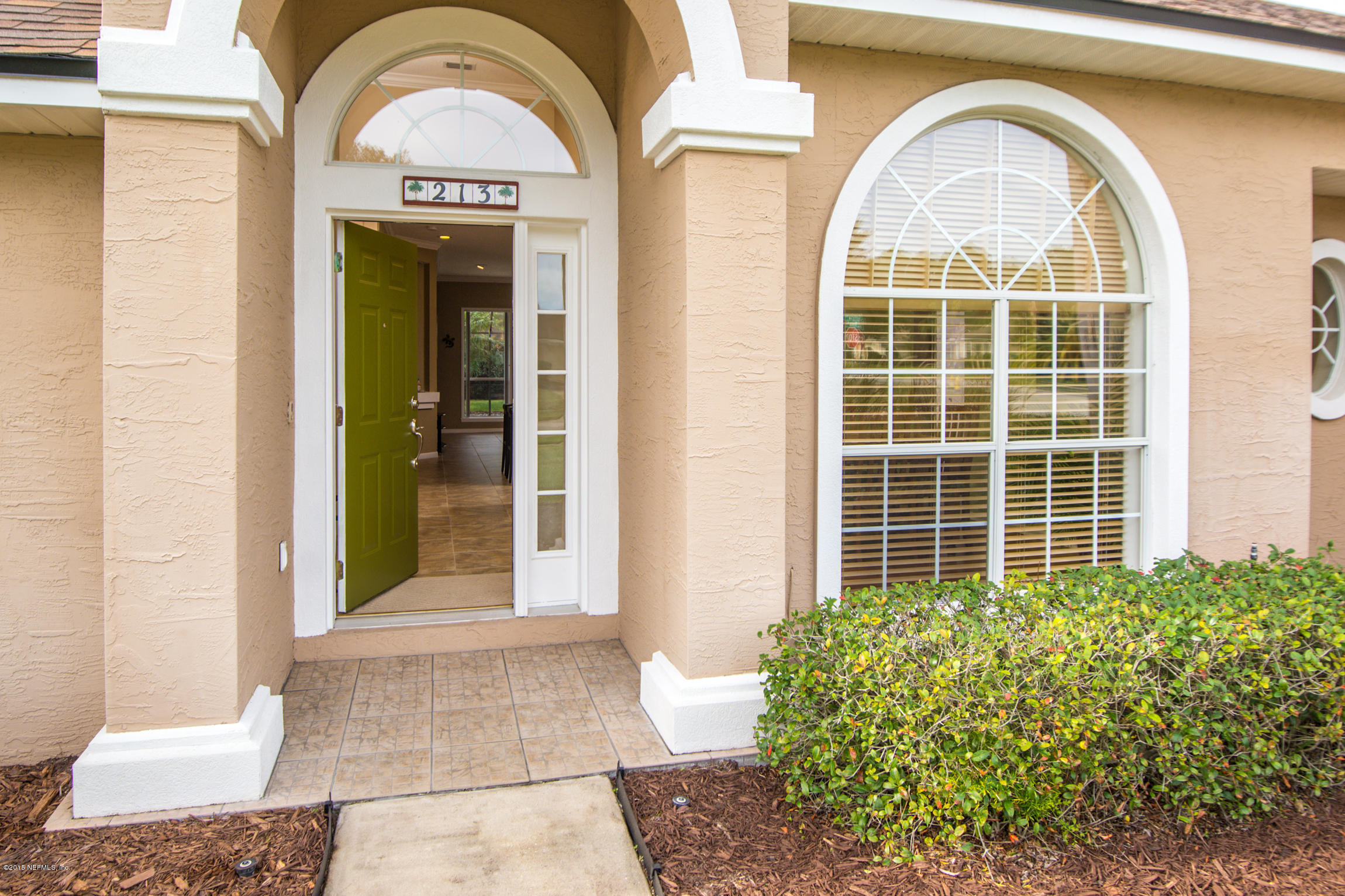 213 Merida Road St. Augustine, FL 32086 - Photo 3 of 34 a view of a door with a glass door