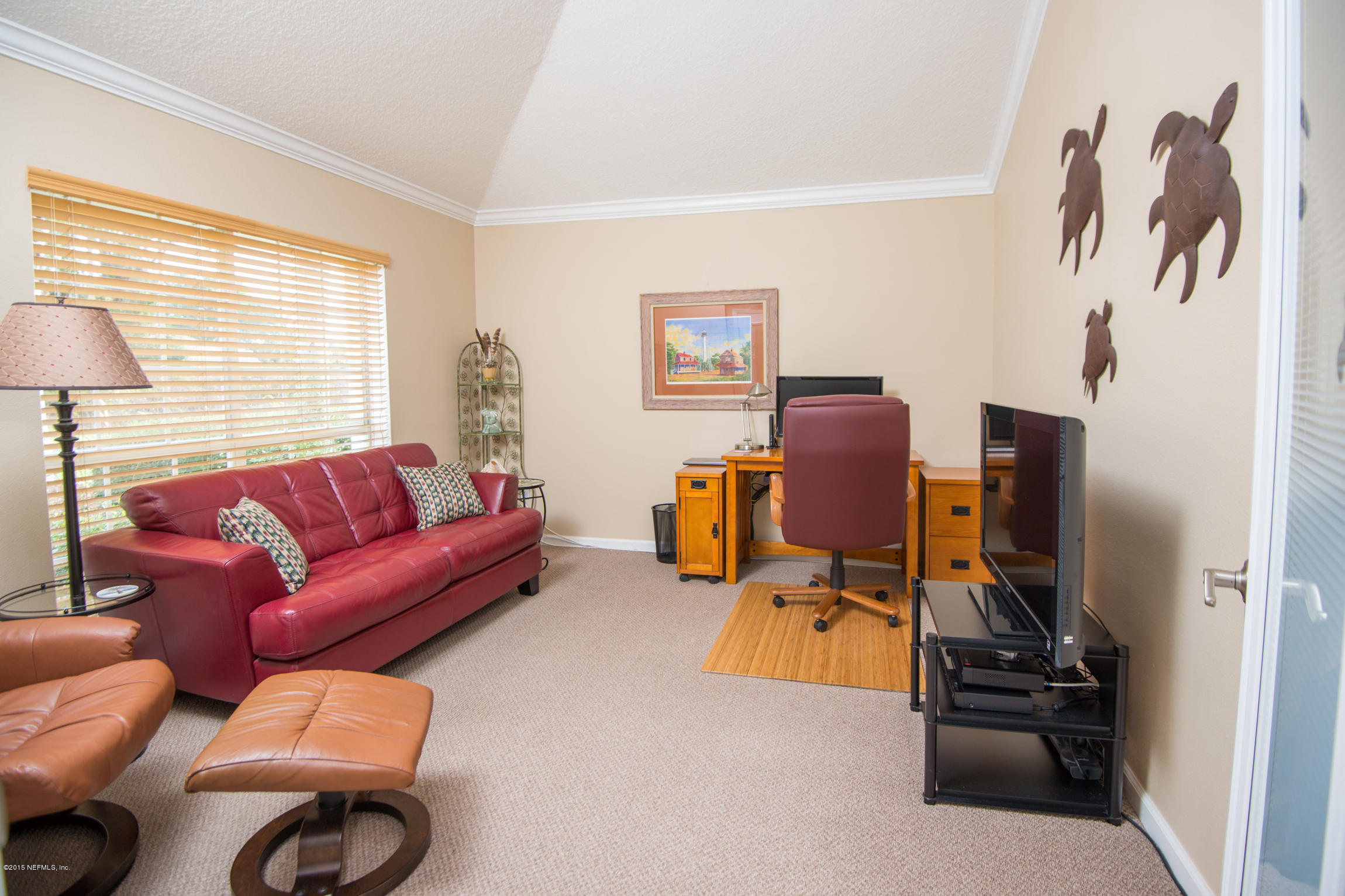 213 Merida Road St. Augustine, FL 32086 - Photo 6 of 34 a living room with furniture and a window