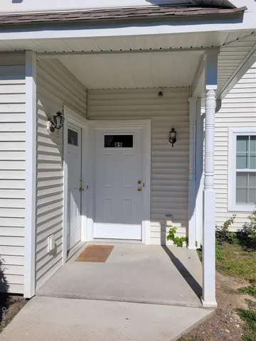 a bathroom with a tub and shower