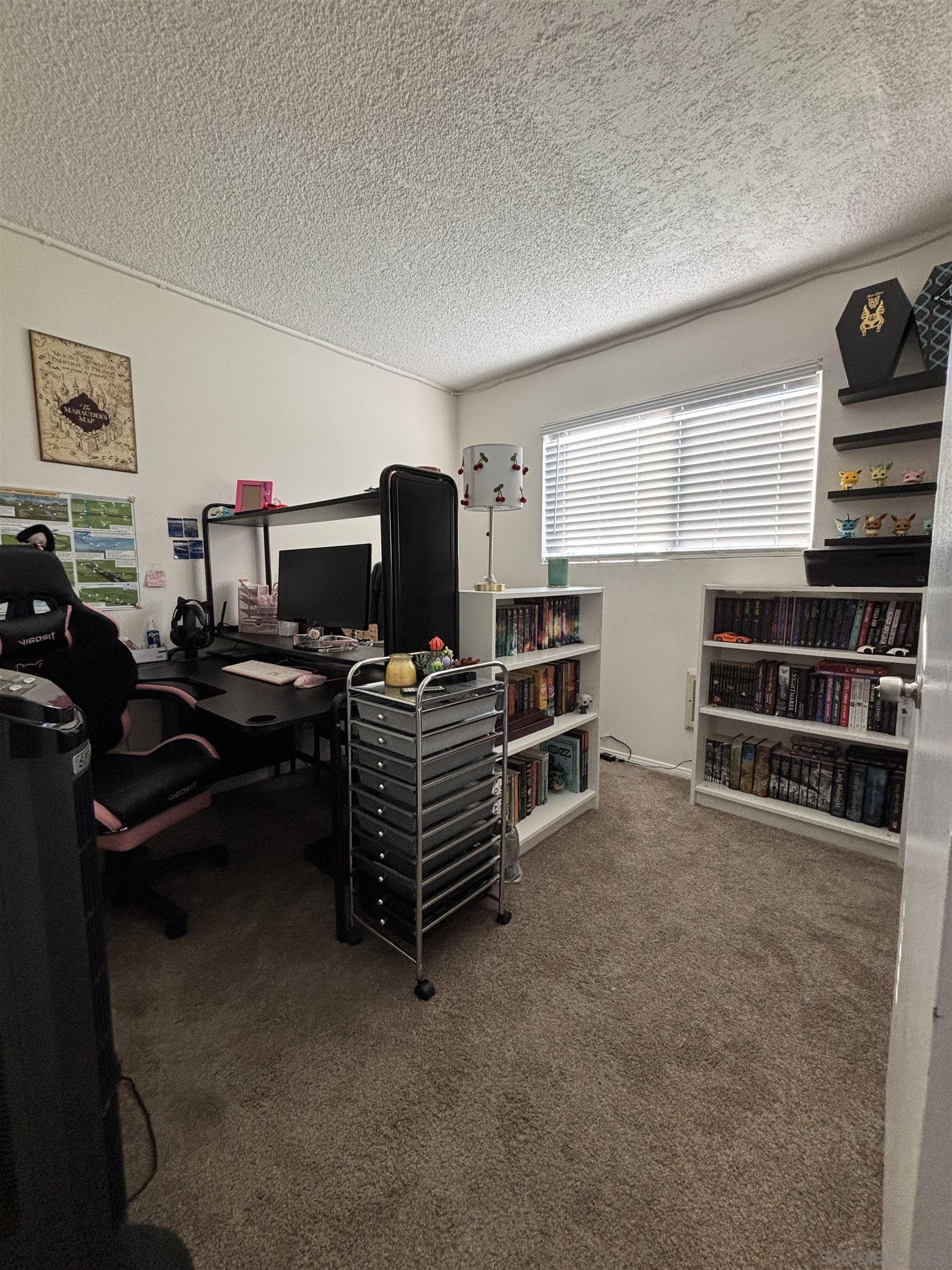 8209 Jema Way Lakeside, CA 92040 - Photo 39 of 40 a room with furniture and a flat screen tv