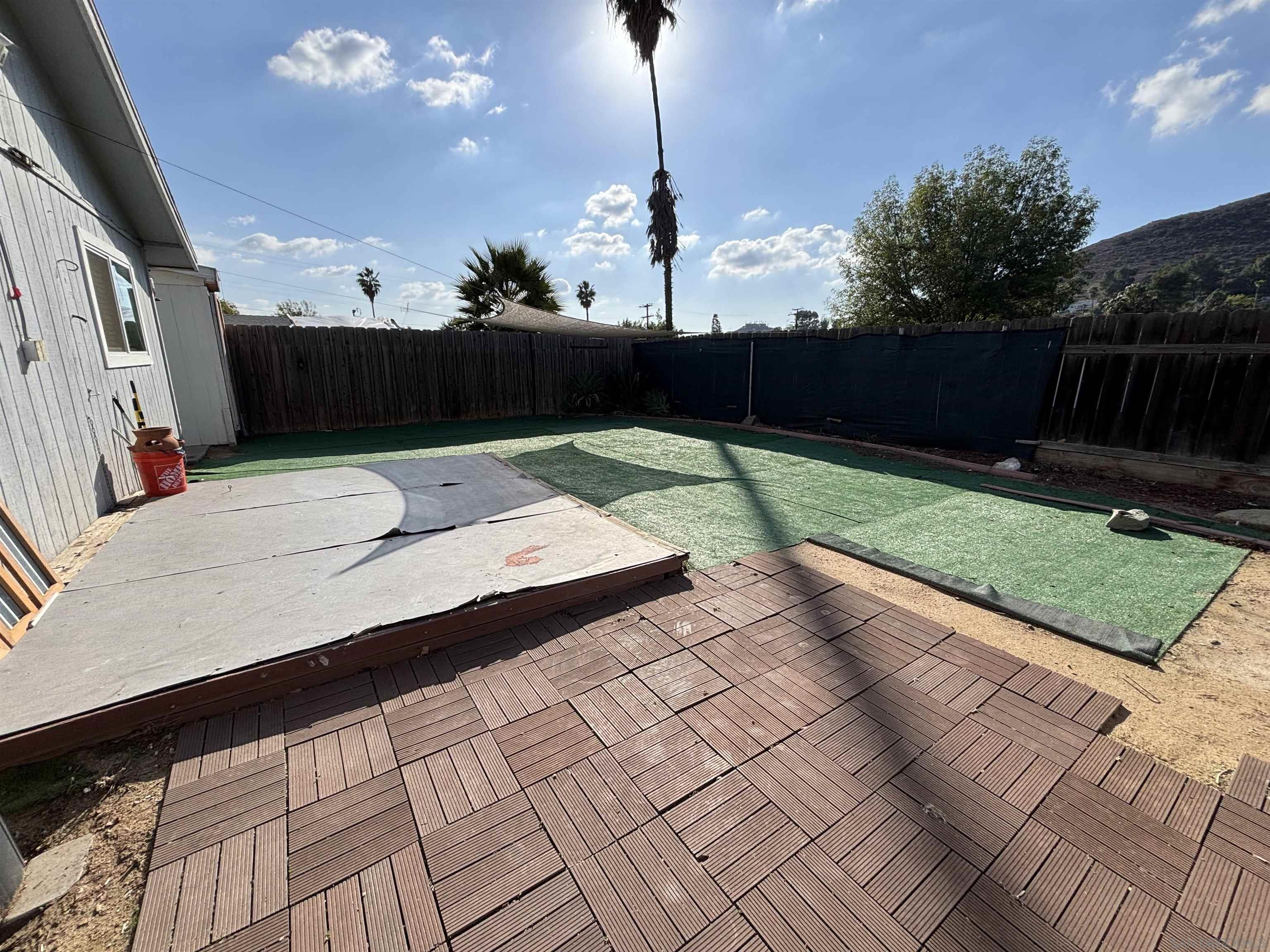 8209 Jema Way Lakeside, CA 92040 - Photo 10 of 40 a backyard of a house with lots of green space