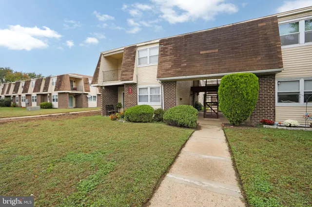 a house view with garden space