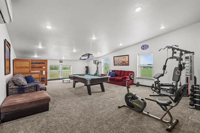 a bedroom with a bed and a table in it