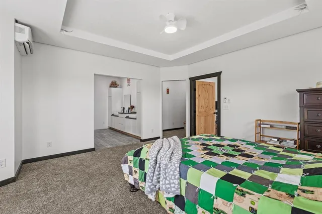 a kitchen with a table and chairs in it
