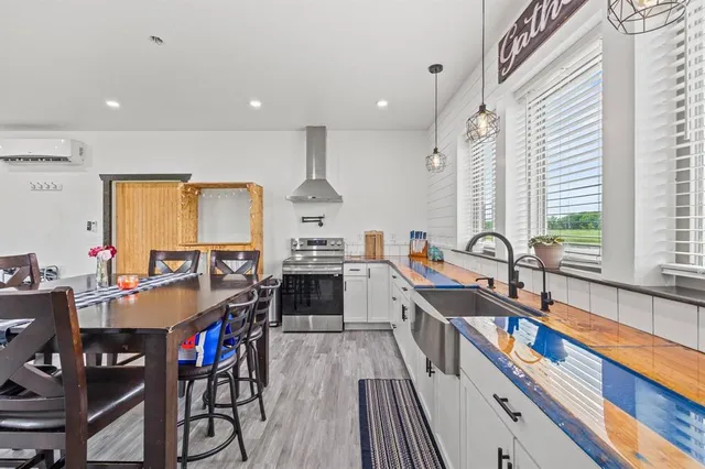 a bedroom with bed and a window