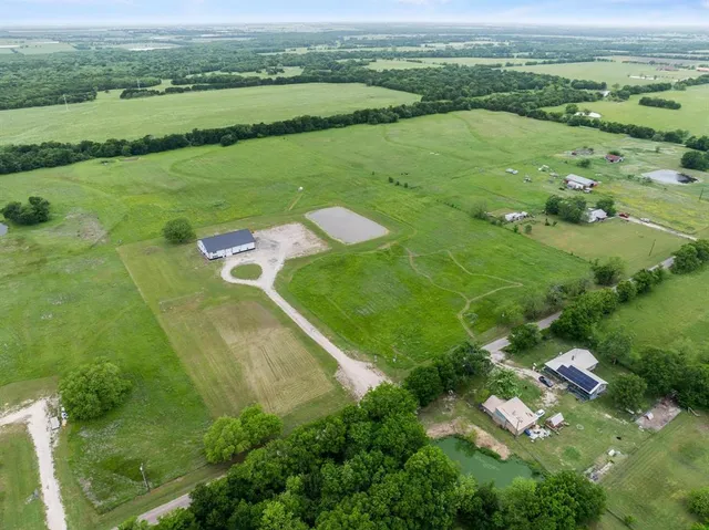 a view of a lake with a big yard