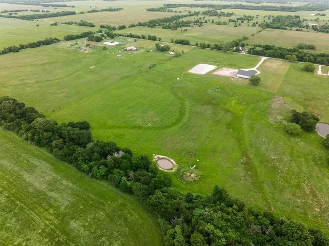 a view of a lake with a big yard