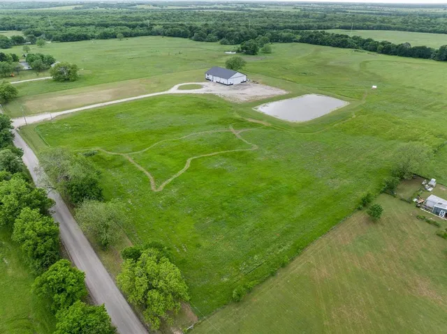 a view of a lake with a big yard