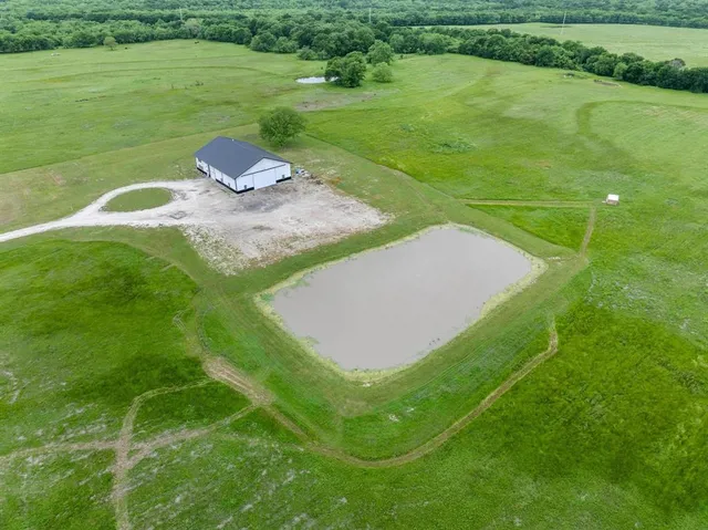 a view of a golf course with a lake