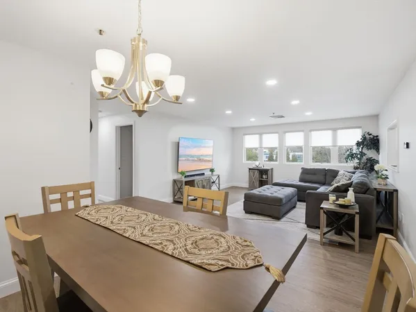a view of a dining room with furniture
