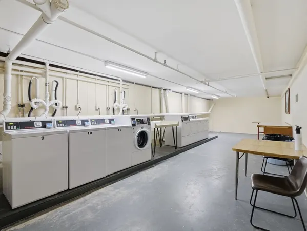 a utility room with cabinets