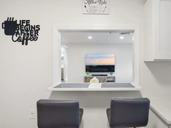 a bathroom with a sink a mirror and a