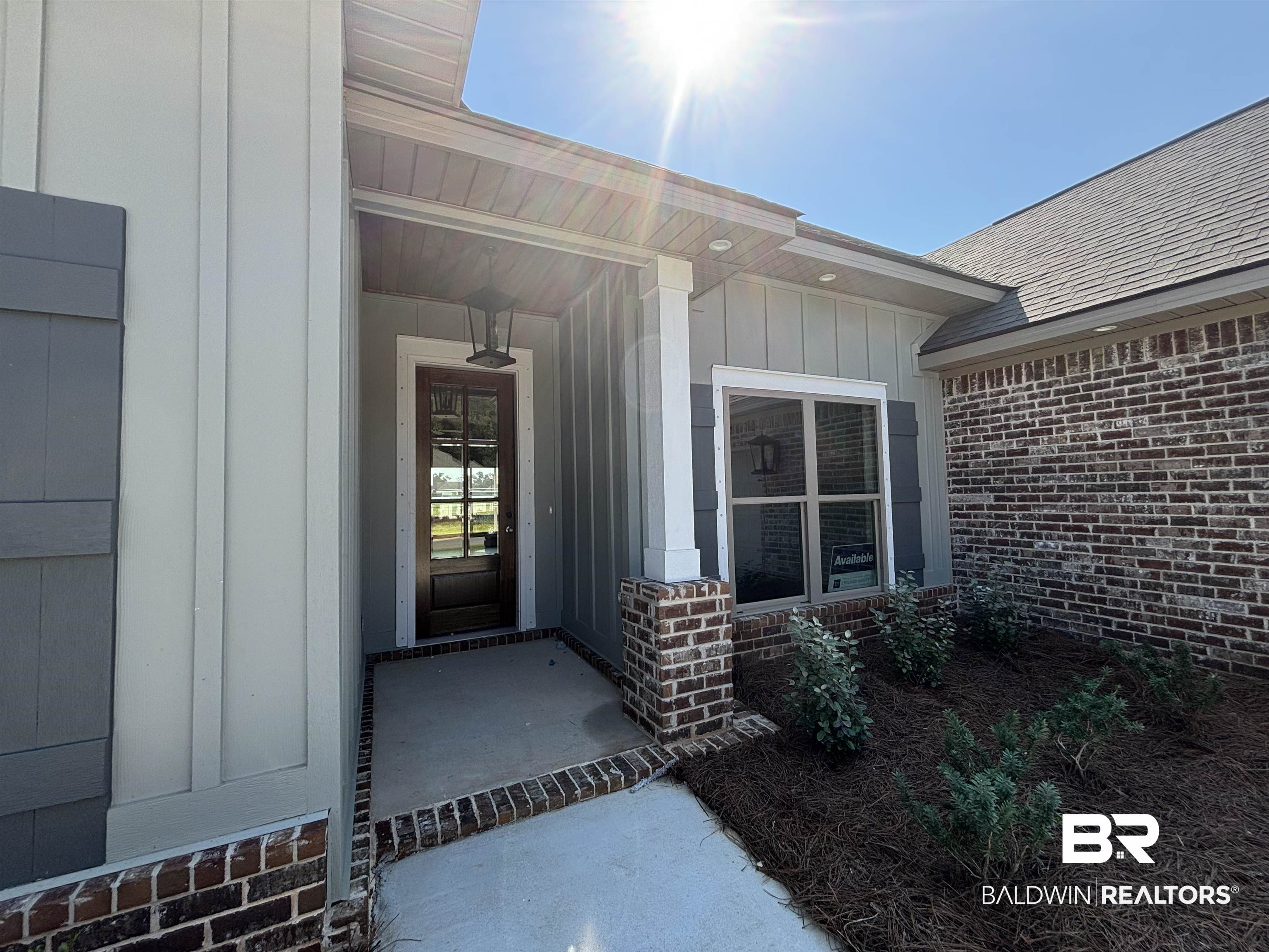 388 Garrison Boulevard Fairhope, AL 36532 - Photo 4 of 34 Entrance to property with covered porch