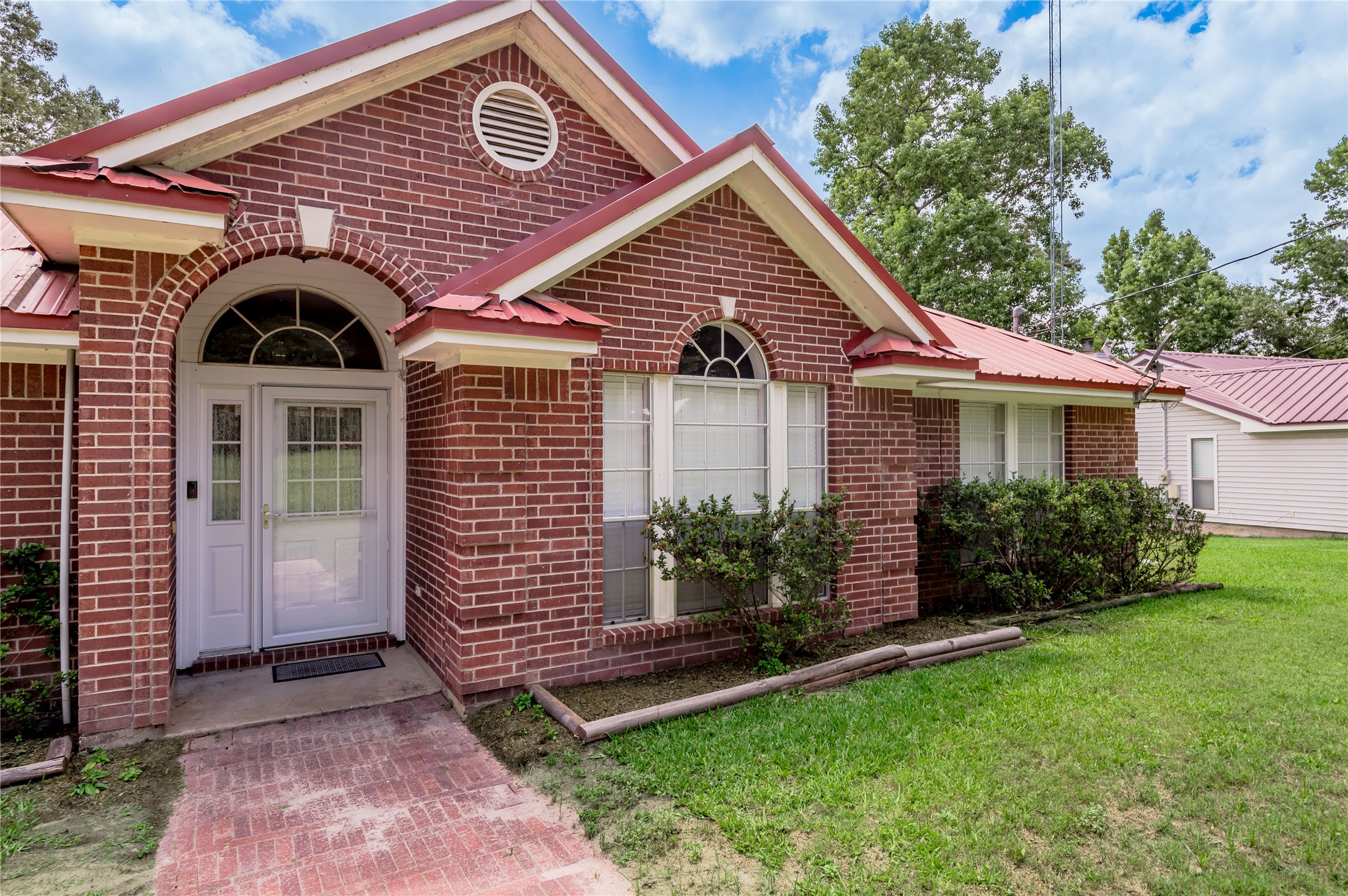 324 Red Oak Lane Trinity, TX 75862 - Photo 10 of 49 a front view of a house with a yard
